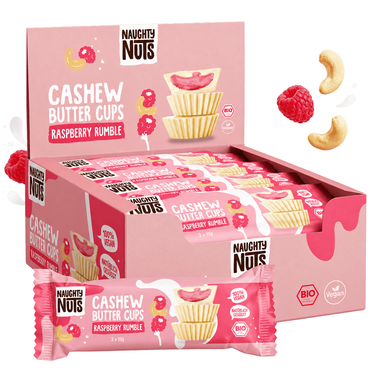 Bio Cashew Butter Cups Raspberry Rumble in Verpackung, mit Himbeeren und Cashewkernen
